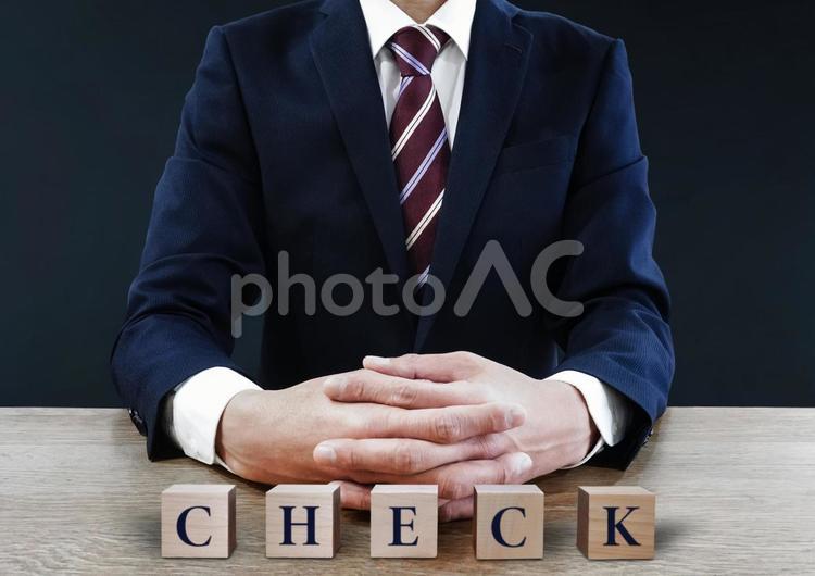 ビジネスマンとチェックの文字 チェック,ビジネスマン,男性の写真素材