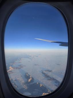 飛行機 車窓 雪 飛行機 車窓 雪 飛行機,フライト,雲の写真素材