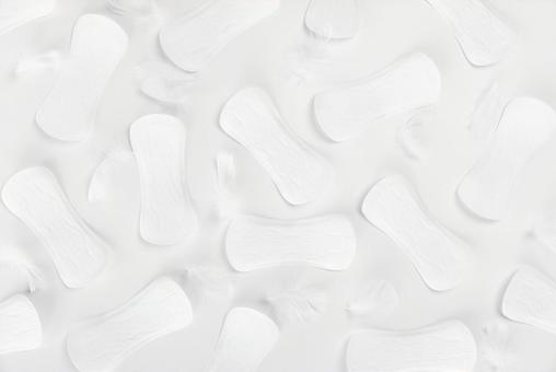 白背景全面に生理用ナプキンが並ぶ 生理,月経,生理用品の写真素材