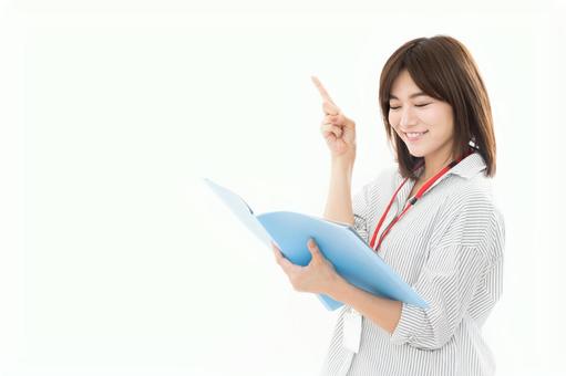 若い女性 ファイル 若い女性 ファイル ファイル,女性,指差しの写真素材