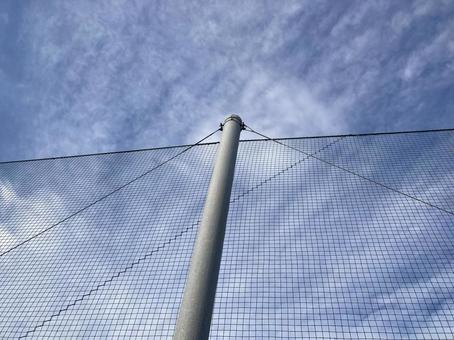 ネット越しの秋の空 ネット越しの秋の空の写真