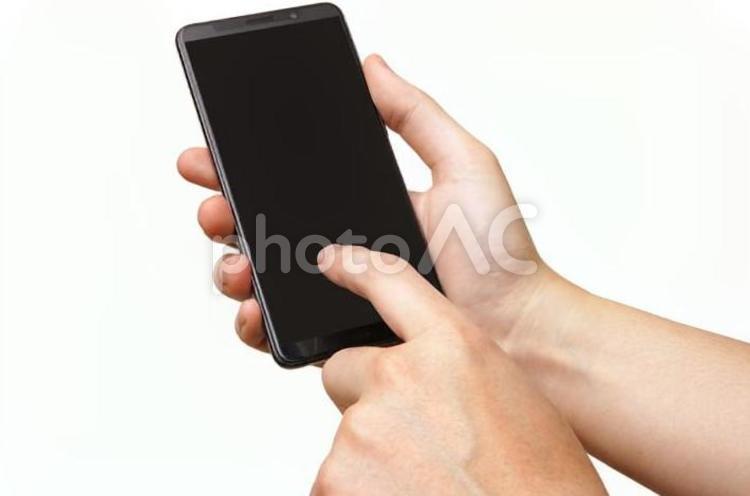スマホを操作する男性の手-白背景 スマホ,スマートフォン,手の写真素材