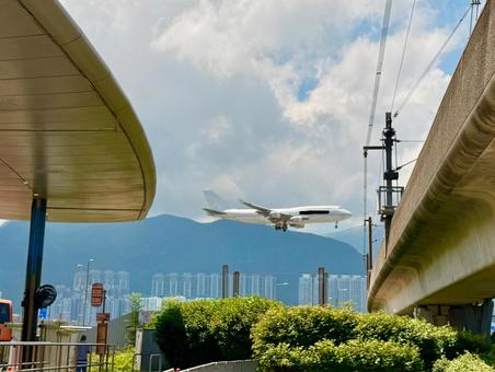 Hong Kong scenery and a landing plane, JPG
