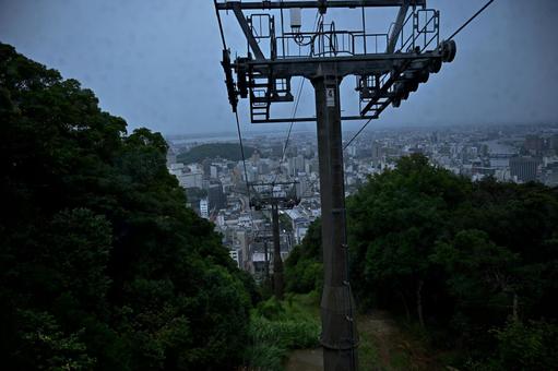 眉山の森を切り開くロープウェイの鉄塔 徳島県,眉山,ロープウェイの写真素材