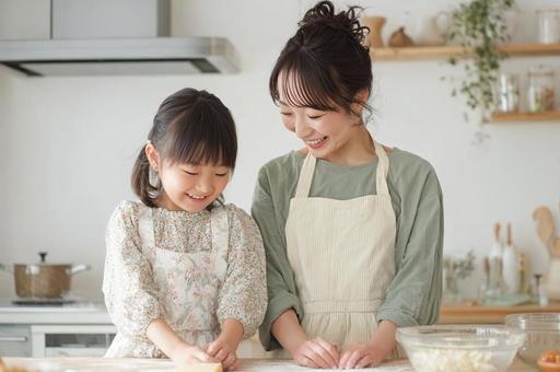 料理をする親子-2 料理をする親子-2の写真