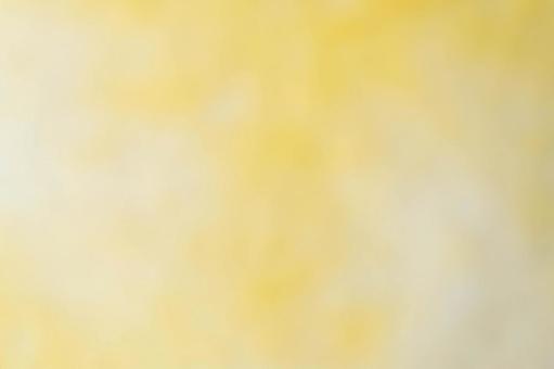 柔らかな黄色のぼかし背景テクスチャ 柔らかな黄色のぼかし背景テクスチャの写真