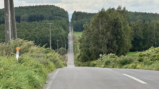 就実の丘のジェットコースターの道 就実の丘,旭川,北海道の写真素材