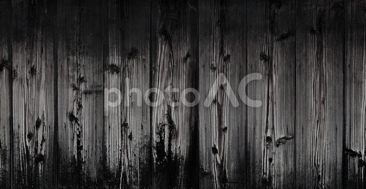 黒色の木目の壁 背景,木目,黒の写真素材