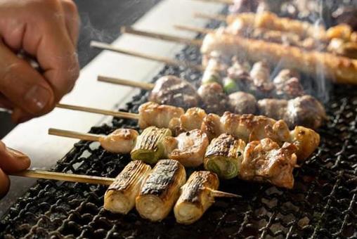 Image of grilling yakitori with a net Image of grilling yakitori with a net