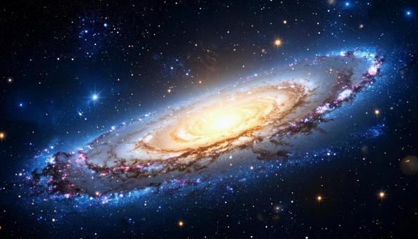 宇宙に漂う黄金の銀河 宇宙に漂う黄金の銀河の写真