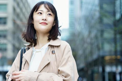 Woman walking in the business district, female, business, business woman, JPG