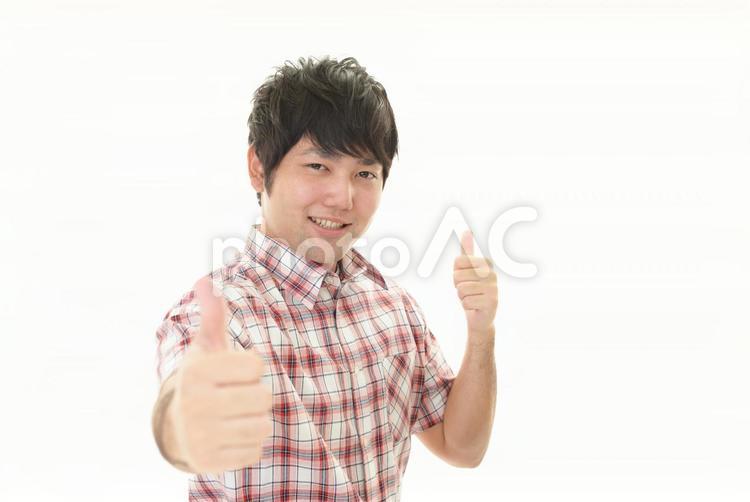 いいねのジェスチャーをする男性 男性,健康,笑顔の写真素材