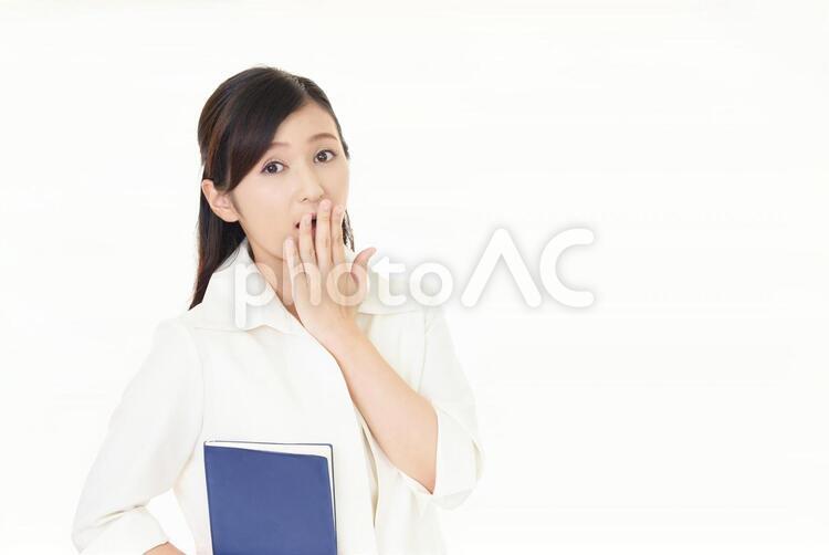驚いた表情のビジネスウーマン 女性,ビジネウーマン,女の写真素材