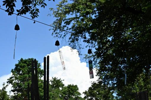 Summer image of wind chimes and cumulonimbus clouds, JPG