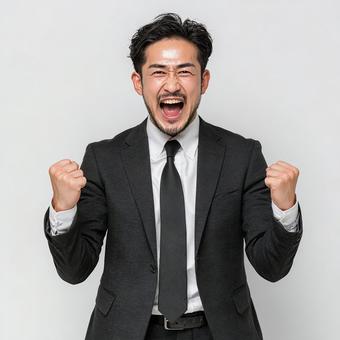 達成感に満ちた表情のビジネスマン 達成感に満ちた表情のビジネスマンの写真