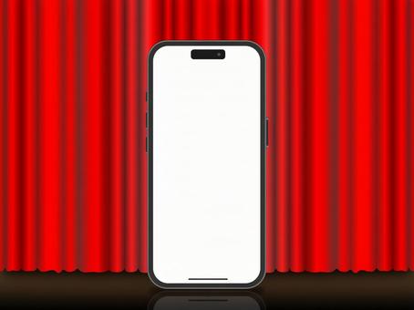レッドカーテン背景のiPhone カーテン,レッド,劇場の写真素材