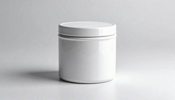 シンプルな白い陶器の入れ物A シンプルな白い陶器の入れ物Aの写真