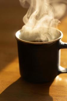 渦を巻く湯気のアップショット_縦 コーヒー,湯気,珈琲の写真素材