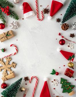 赤と白を基調にしたクリスマス雑貨フレーム 赤と白を基調にしたクリスマス雑貨フレームの写真
