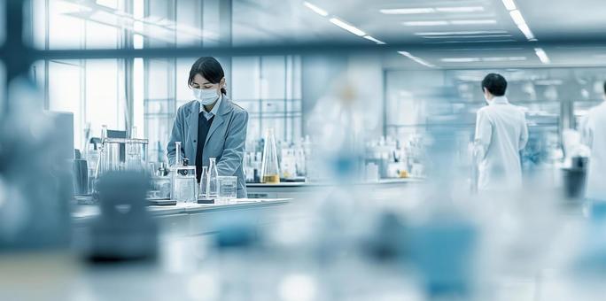研究所の職員と白衣の研究員スタッフ 研究所の職員と白衣の研究員スタッフの写真