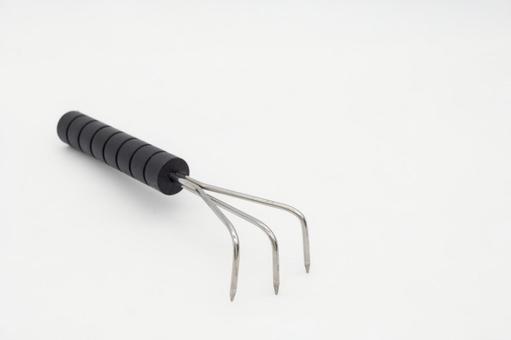 白背景に三本熊手 三本熊手,草むしり,雑草取りの写真素材