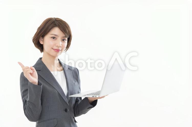 ビジネスウーマン　ノートパソコン ビジネスウーマン,ノートパソコン,指差しの写真素材