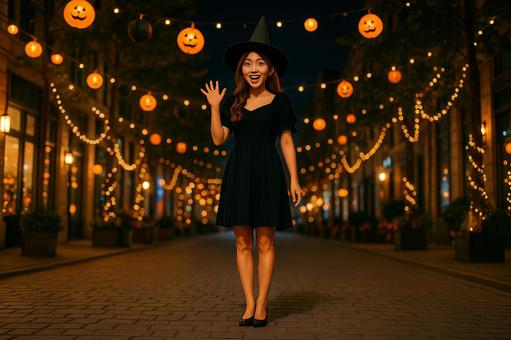 魔女帽子で笑顔の女性 魔女帽子で笑顔の女性の写真