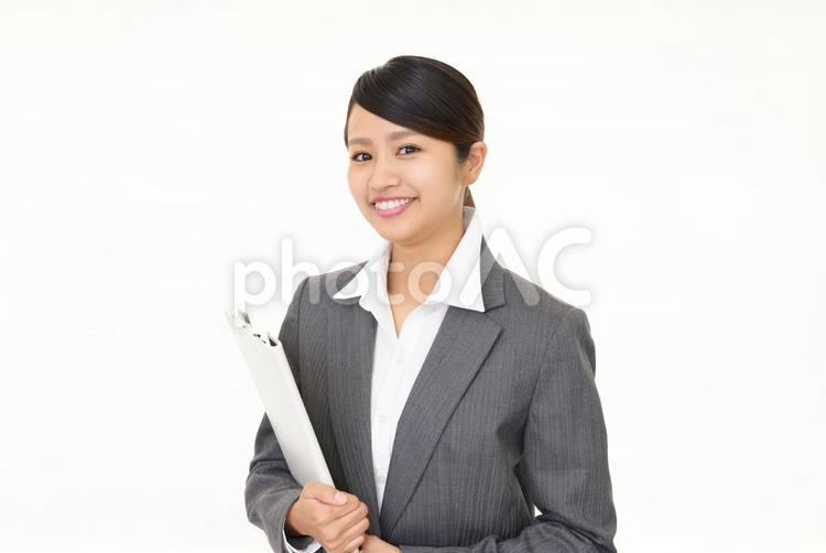 笑顔のビジネスウーマン 女性,ビジネスウーマン,仕事の写真素材