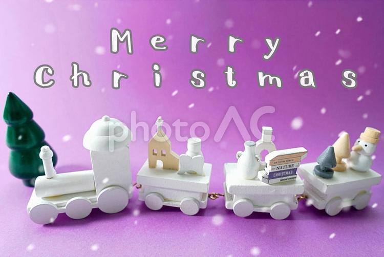 Merrt Chistmas （メリークリスマス）文字入りのクリスマスカード、木製の汽車に雪が降る クリスマスカード,クリスマス,カードの写真素材