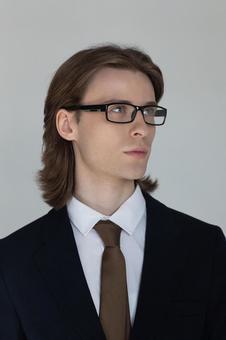 スーツ姿にメガネの男性 男性,外国人,欧米人の写真素材