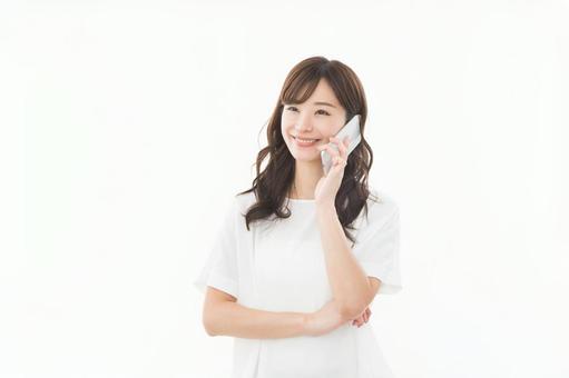 若い女性 スマートフォン ガッツポーズ 若い女性 スマートフォン ガッツポーズ スマートフォン,女性,ビジネスの写真素材