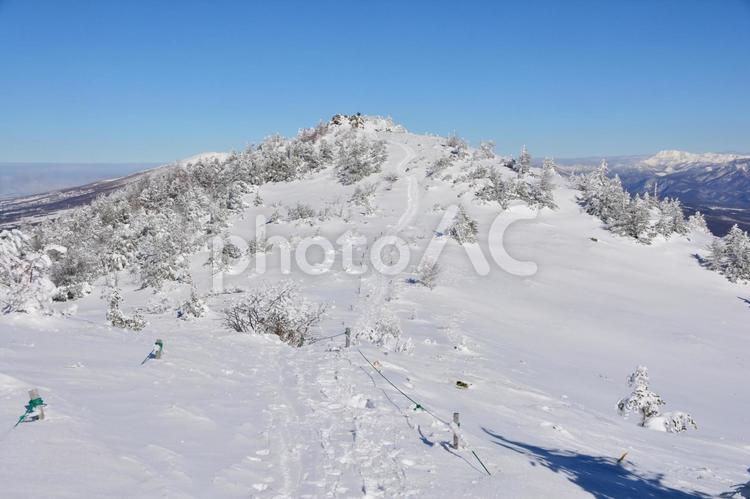 冬の湯ノ丸山の北峰 湯ノ丸山,山頂,頂上の写真素材