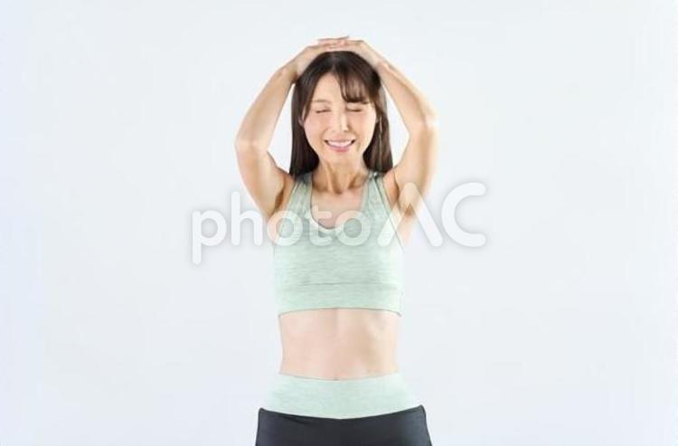 落ち込むスポーツウェアを着た女性 女性,落ち込む,失敗の写真素材