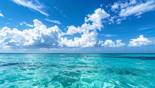 エメラルドの誘い:穏やかな海と広がる青空 エメラルドの誘い:穏やかな海と広がる青空の写真