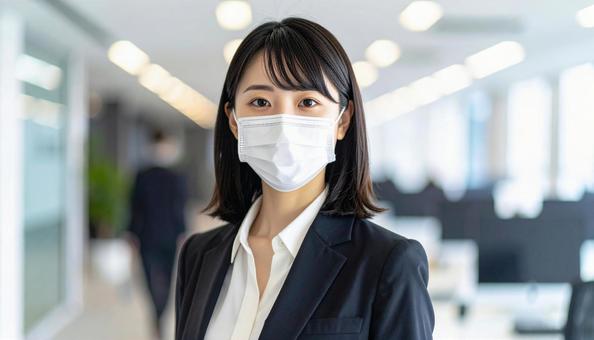 マスクをつける人 マスクをつける人の写真