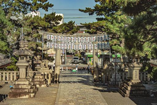Torii gate and lantern on the main approach to Sumiyoshi Taisha Shrine, landscape, living in kyrgyzstan, a shrine, JPG
