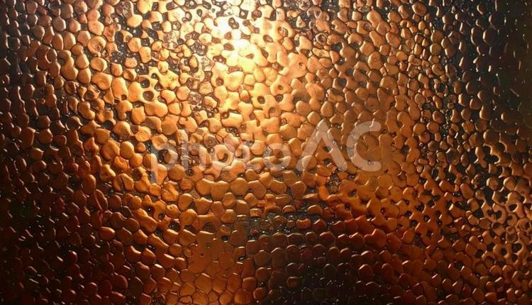 銅メタル　ハンマー加工　金属背景 銅,メタル,ハンマー加工の写真素材