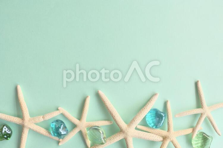 夏のイメージとヒトデの背景素材 貝殻,貝がら,介殻の写真素材