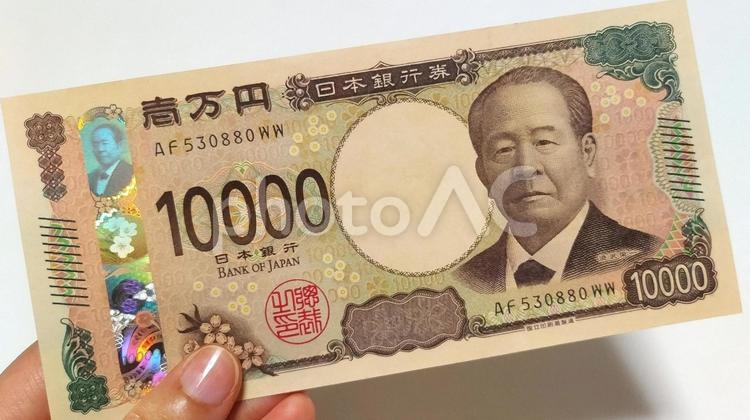 一万円札一枚 一万円札,10000円,手の写真素材