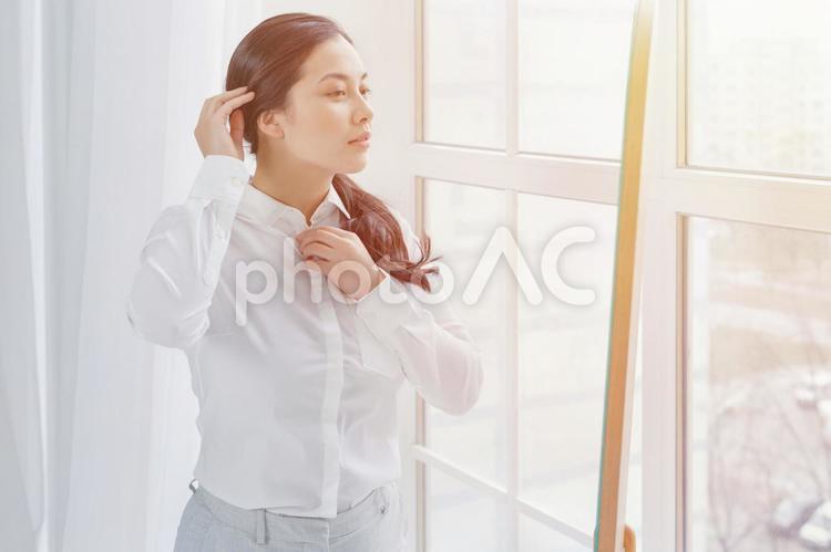 身だしなみを整える女性6 女性,アジア人,身だしなみの写真素材