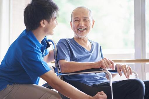 Wheelchair-riding elderly and caregivers, ältere menschen, krankenschwestern, ein mann, JPG