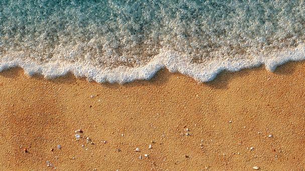 砂浜と海の美しいテクスチャの写真