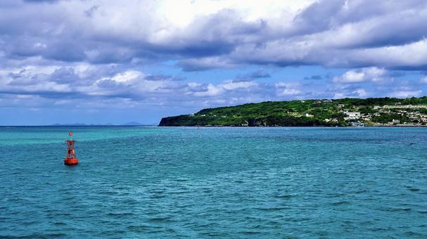 海から見える古宇利島 海から見える古宇利島 古宇利島,海,空の写真素材