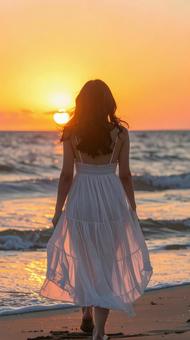 夕日を見る少女 夕日を見る少女の写真