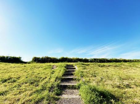 Embankment stairs and blue sky on a sunny day, JPG