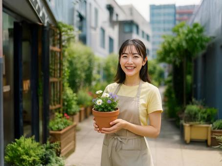 花を持つ女性 花を持つ女性の写真