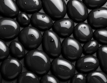 黒いワックスの楕円しずく集合 黒いワックスの楕円しずく集合の写真