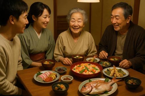 お祝い料理を囲む家族 お祝い料理を囲む家族の写真