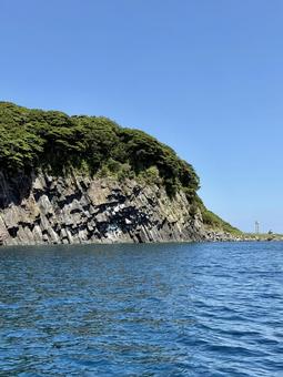 遊覧船から見た福井県東尋坊 雄島の景色 遊覧船から見た福井県東尋坊 雄島の景色 アクティビティ,水面,遊覧船の写真素材