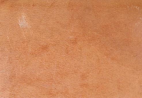 傷のあるブラウンレザー質感 傷のあるブラウンレザー質感 革,レザー,ブラウンの写真素材